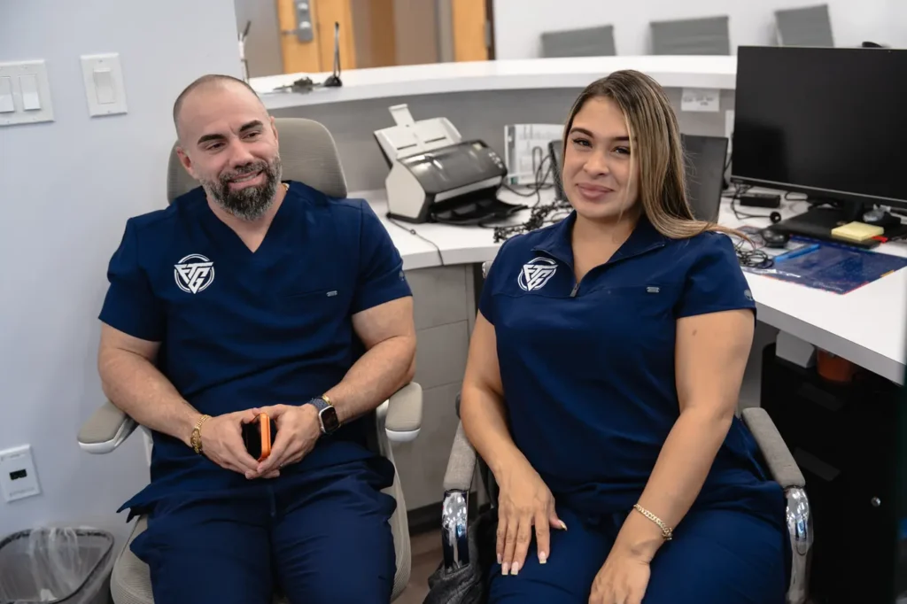 FTG Ortho care team members at the clinic front desk in Aventura